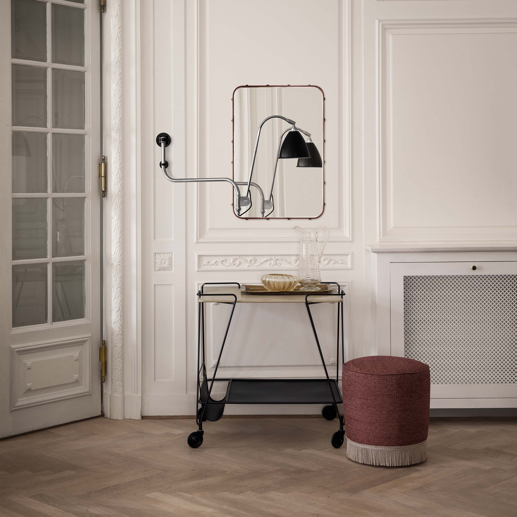 Mobile / Adnet Wall Mirror, designed by Jacques Adnet and made by Gubi
