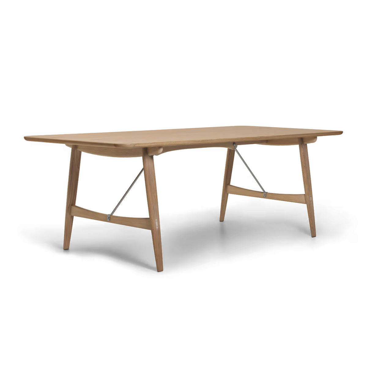 Carl Hansen & Søn BM1160 Hunting Table by Børge Mogensen. A light wood table with angled legs and metal braces.