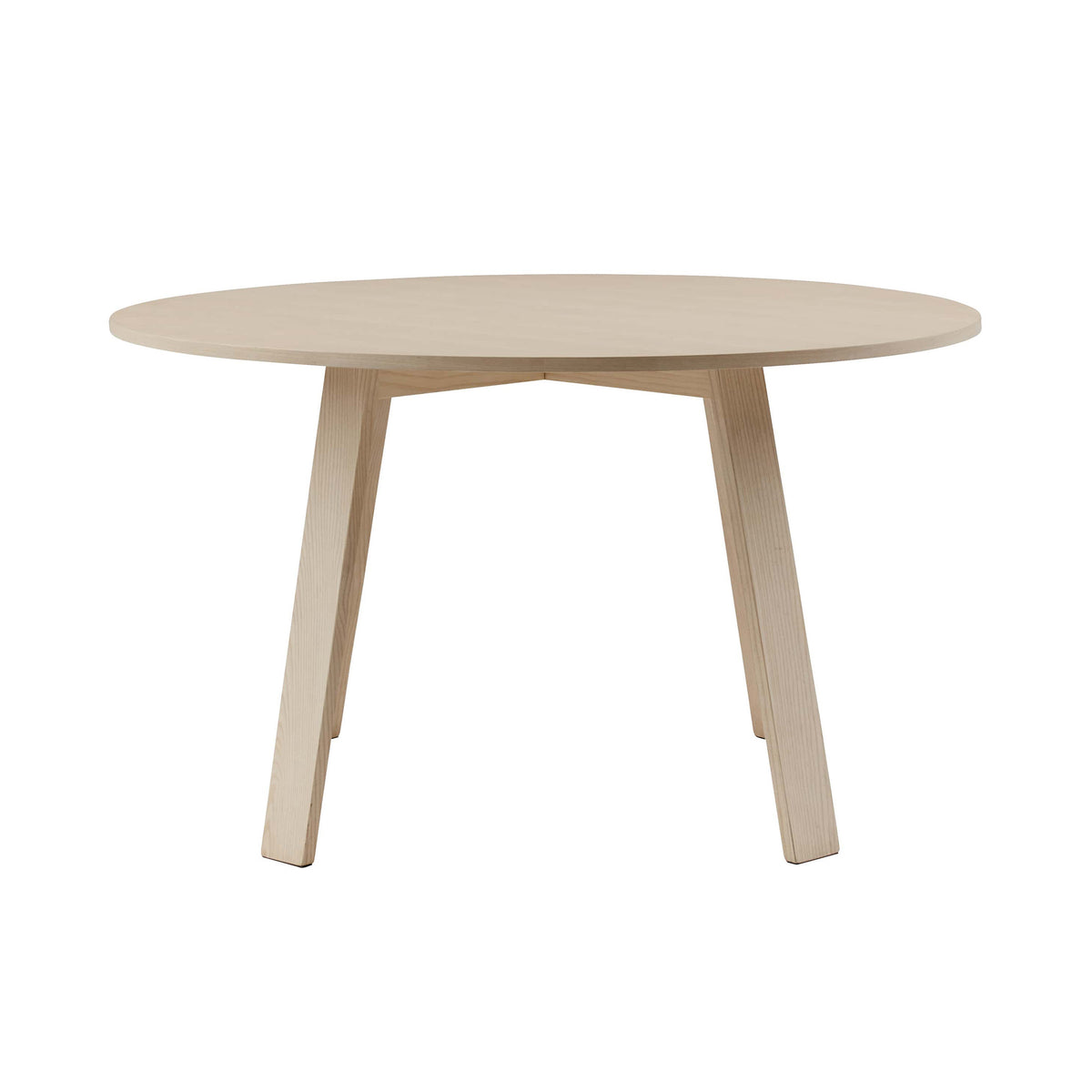 Cappellini Bac Table by Jasper Morrison. A light wood round table with four tapered legs in a minimalist style.