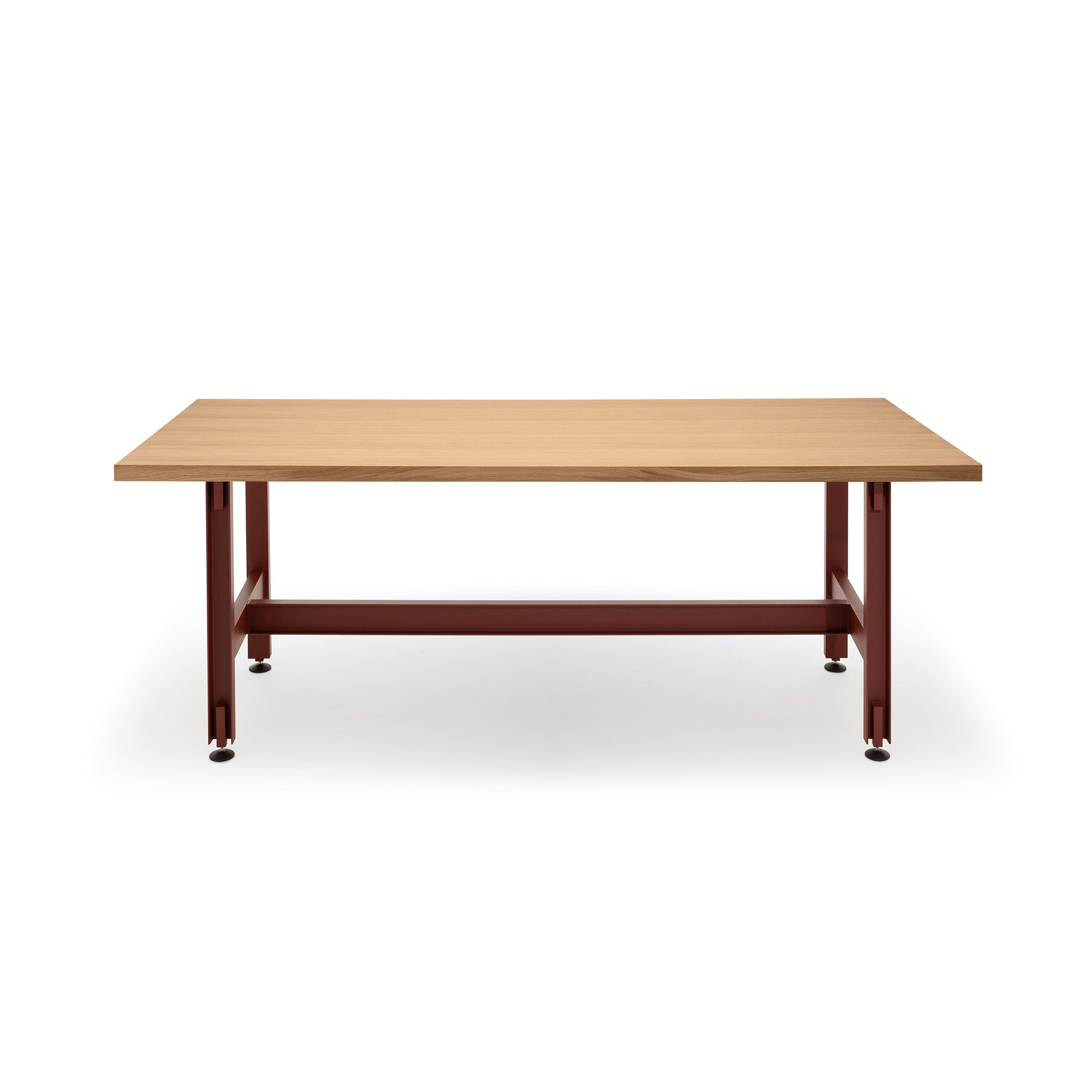 Established & Sons Beam Table by Konstantin Grcic. A wooden table with a light top and dark red metal frame.