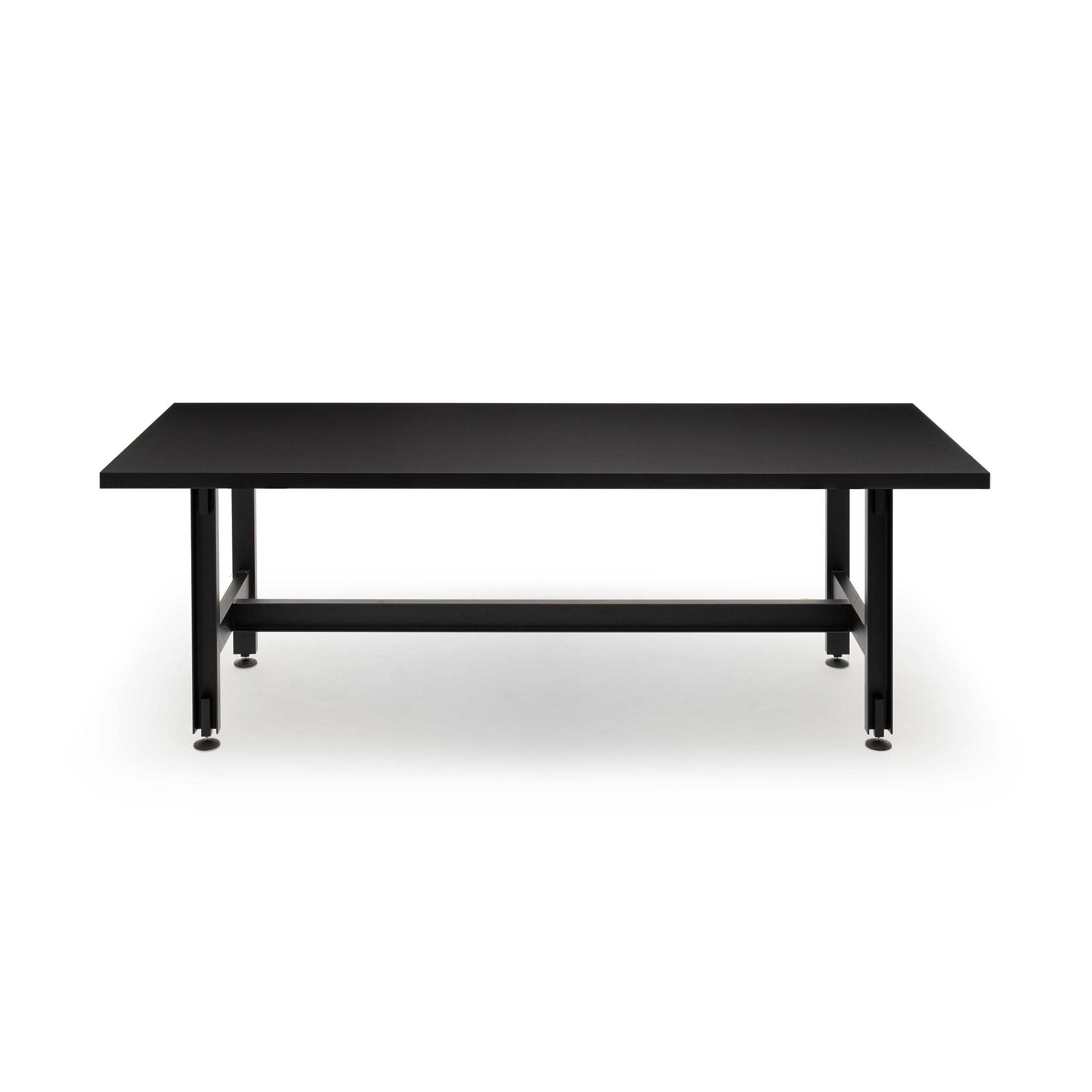 Established & Sons Beam Table by Konstantin Grcic. A sleek black metal table with a sturdy frame and shelf.