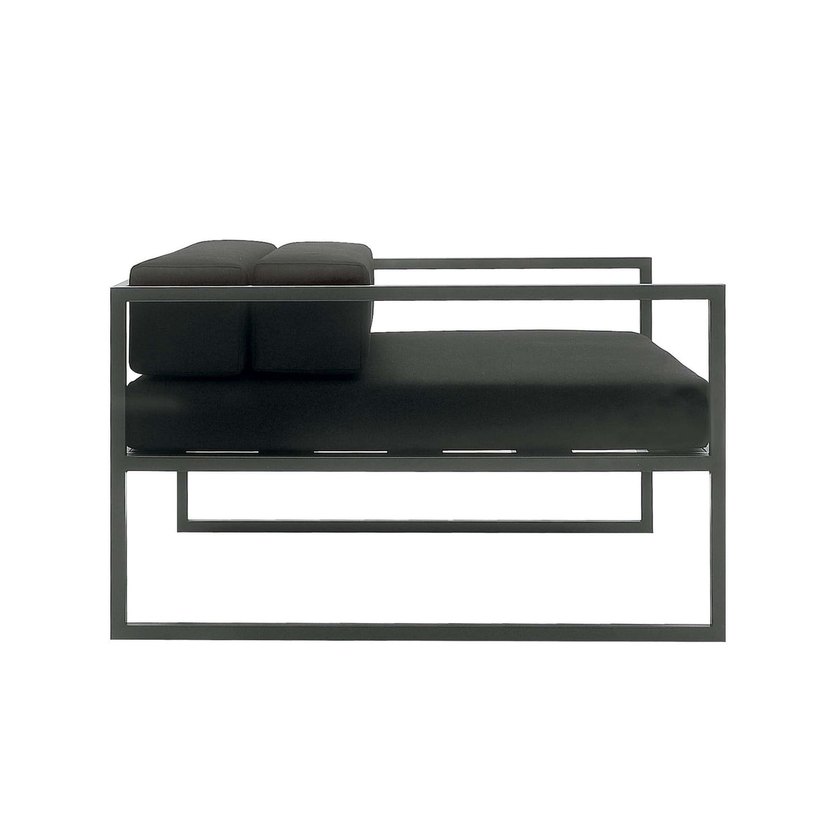 Cappellini Fronzoni '64 Armchair by AG Fronzoni 1964. Dark metal frame bed with black upholstered mattress and pillows.