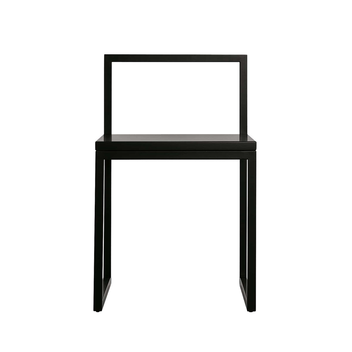 Cappellini Fronzoni '64 Chair by AG Fronzoni 1964. A sleek black metal frame chair with minimalist design sits against white.