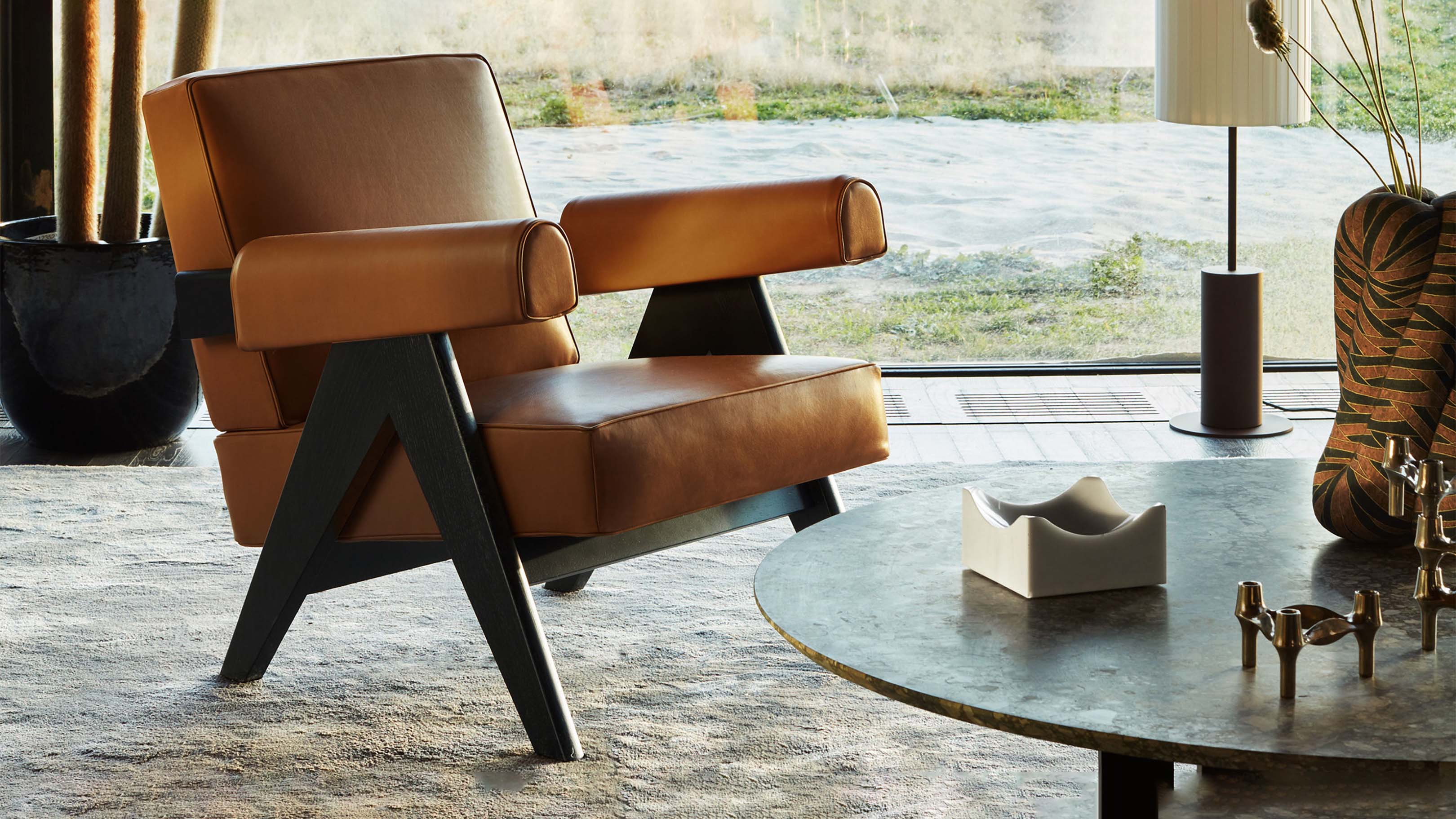 Desktop / Capitol Complex Armchair, designed by Pierre Jeanneret and made by Cassina