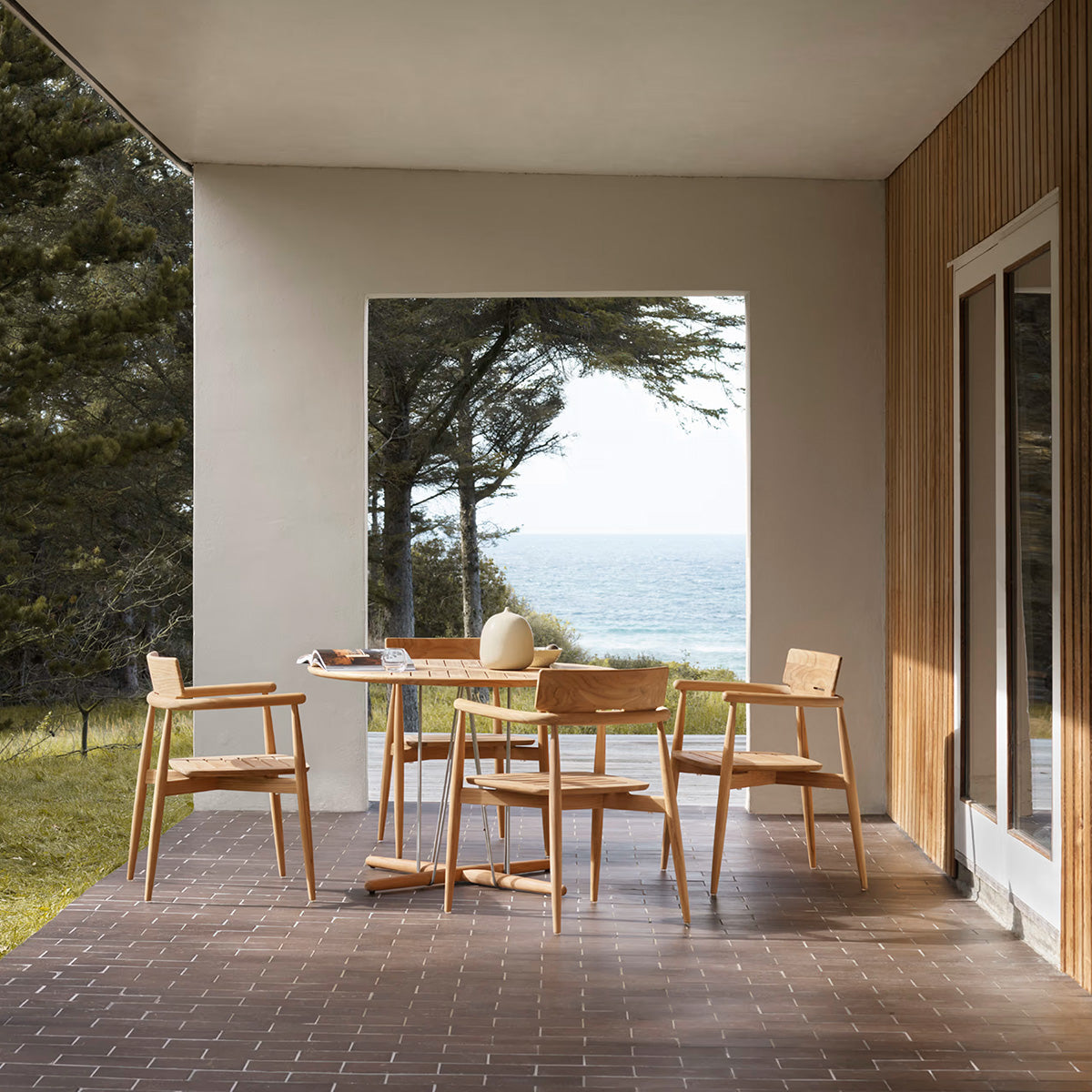 Mobile / E008 Embrace Outdoor Dining Chair, designed by EOOS for Carl Hansen & Son