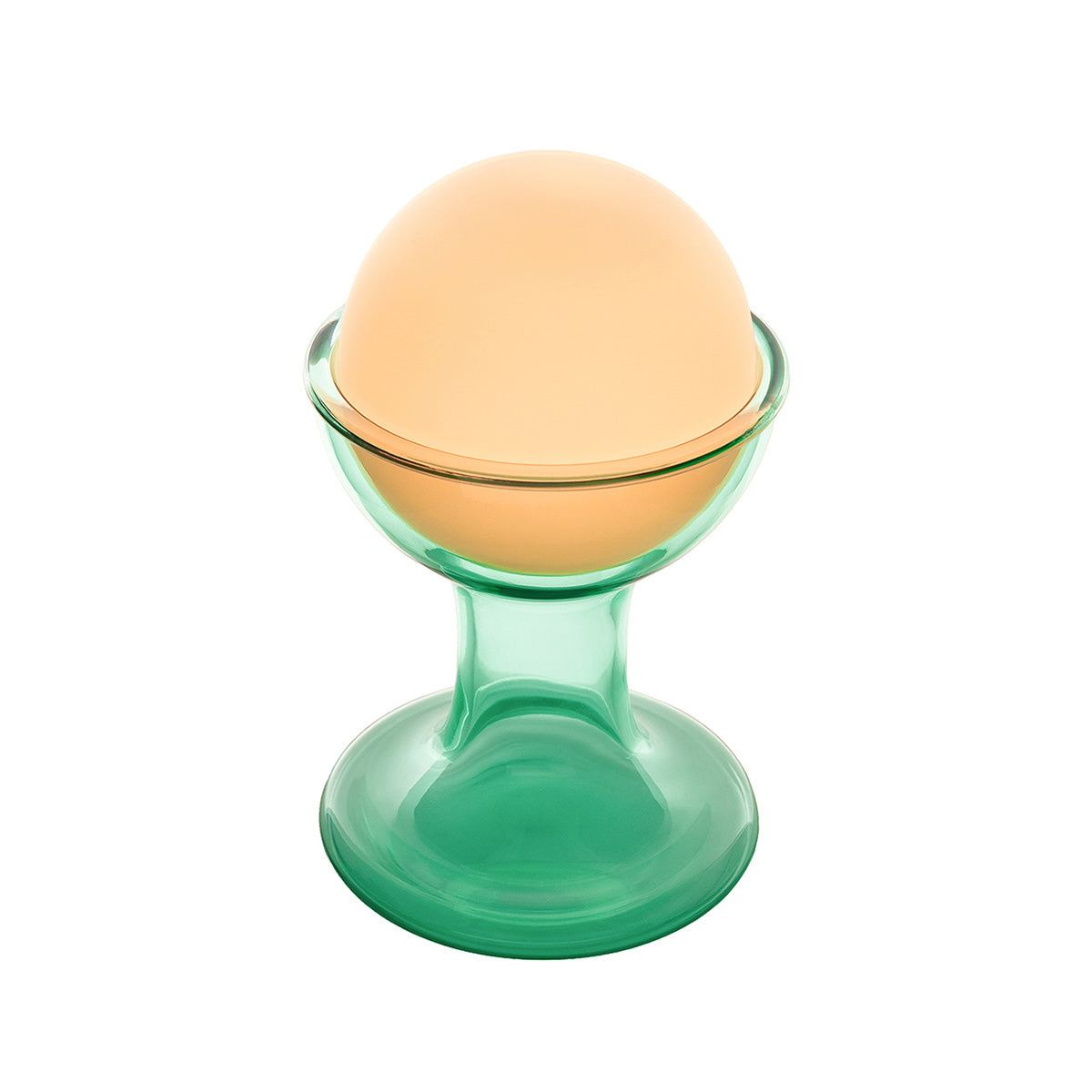 Established & Sons Gelato Lamp by Carlo Nason. A peach-colored sphere rests in a green glass pedestal bowl.