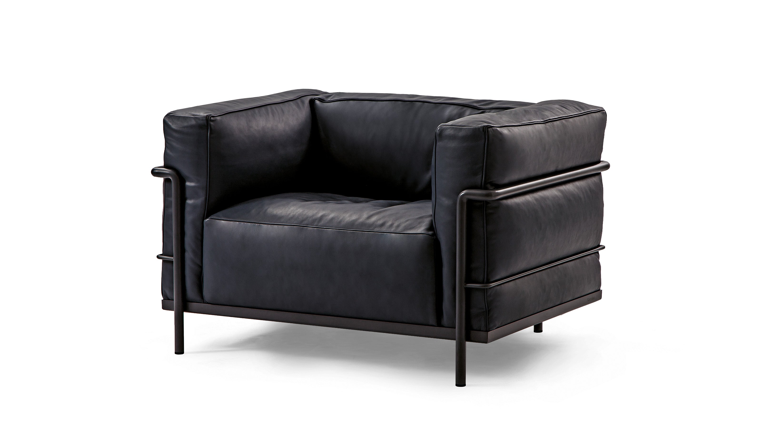 Desktop / LC3 Armchair, designed by Le Corbusier, Pierre Jeanneret, and Charlotte Perriand and made by Cassina