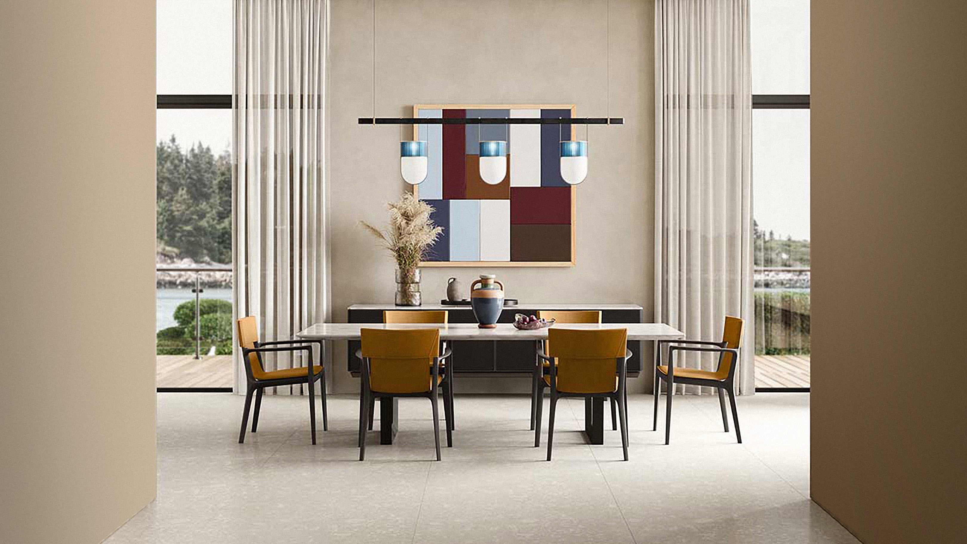 Saddle Leather Cammello / Desktop / Isadora Chair with arms, designed by Roberto-Lazzeroni and made by Poltrona Frau