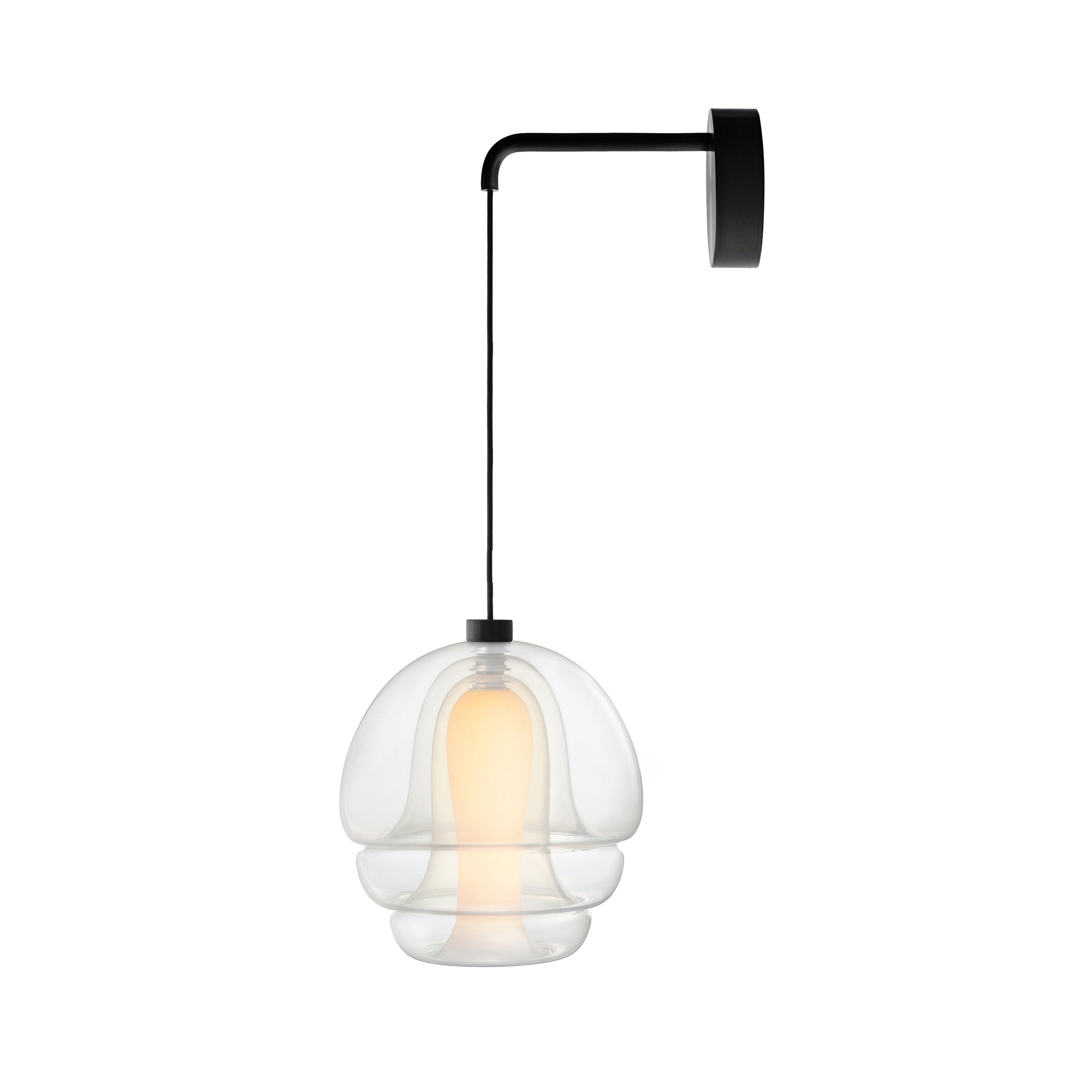 Established & Sons Medusa Wall Lamp by Carlo Nason. A black metal pendant lamp with a clear glass dome shade glows warmly.