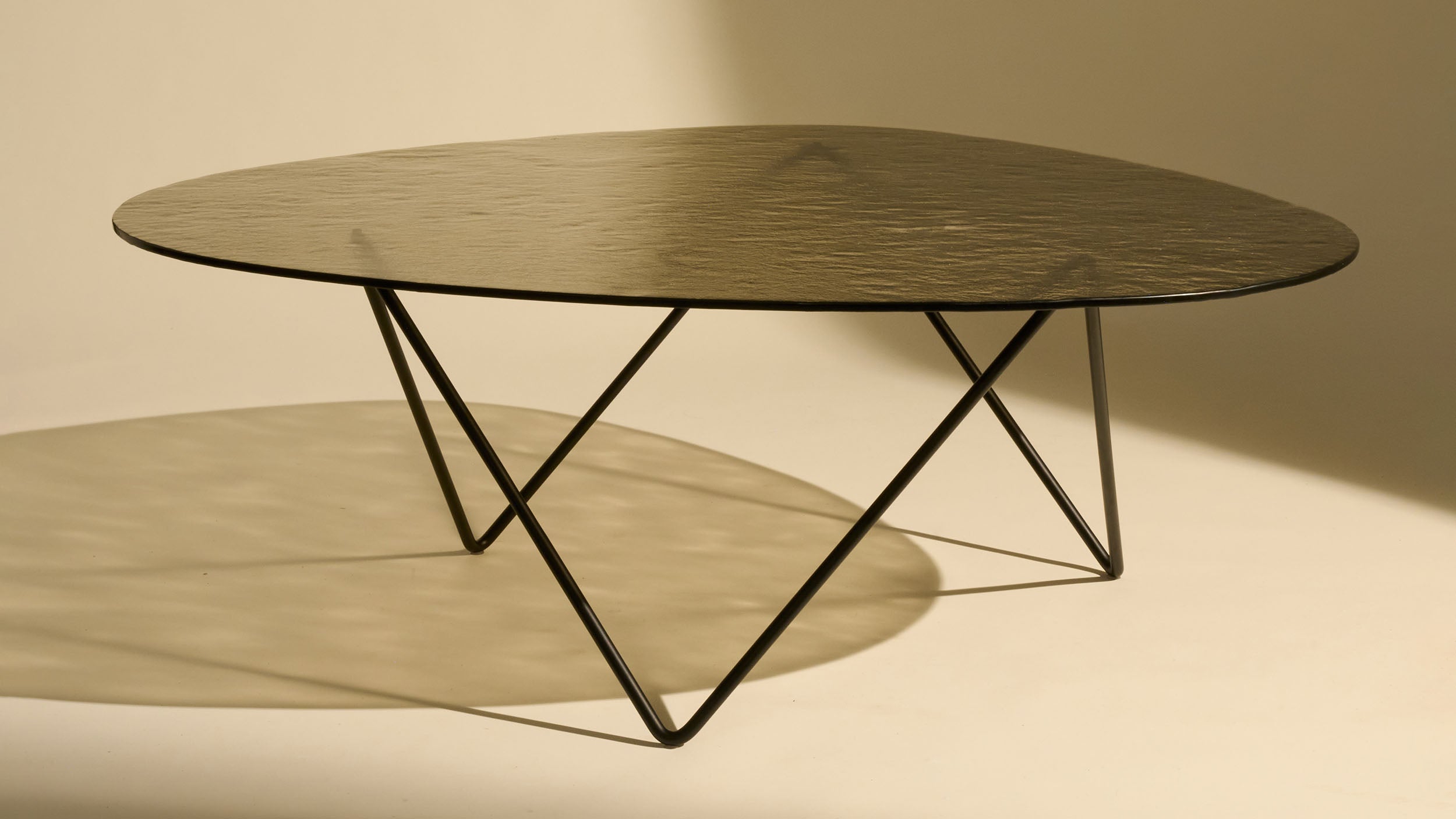 Desktop / Pedrera Coffee Table, designed by Barba Corsini and made by Gubi