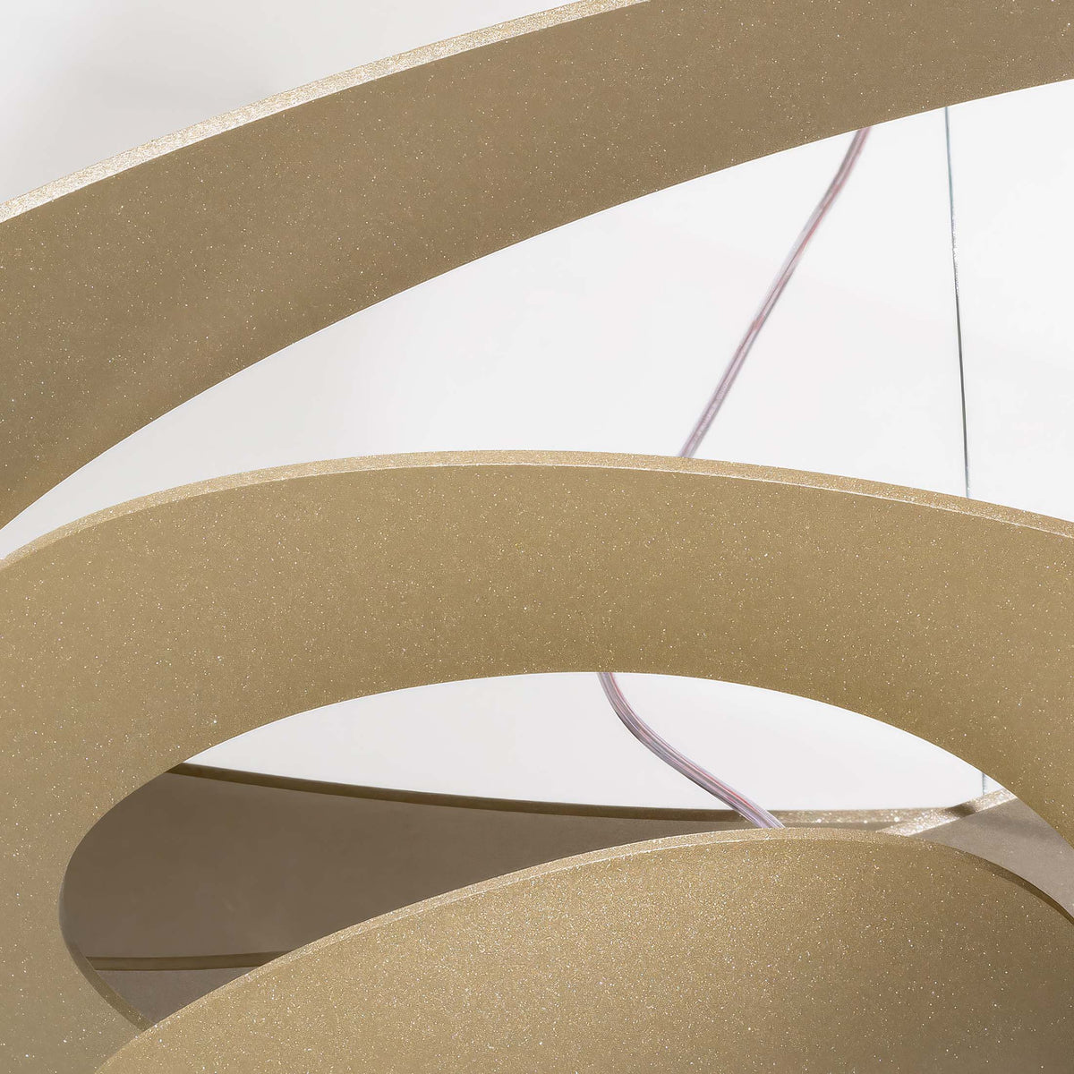 Artemide Pirce by Giuseppe Maurizio Scutellà. Spiraling gold bands with sparkle finish create elegant curves.