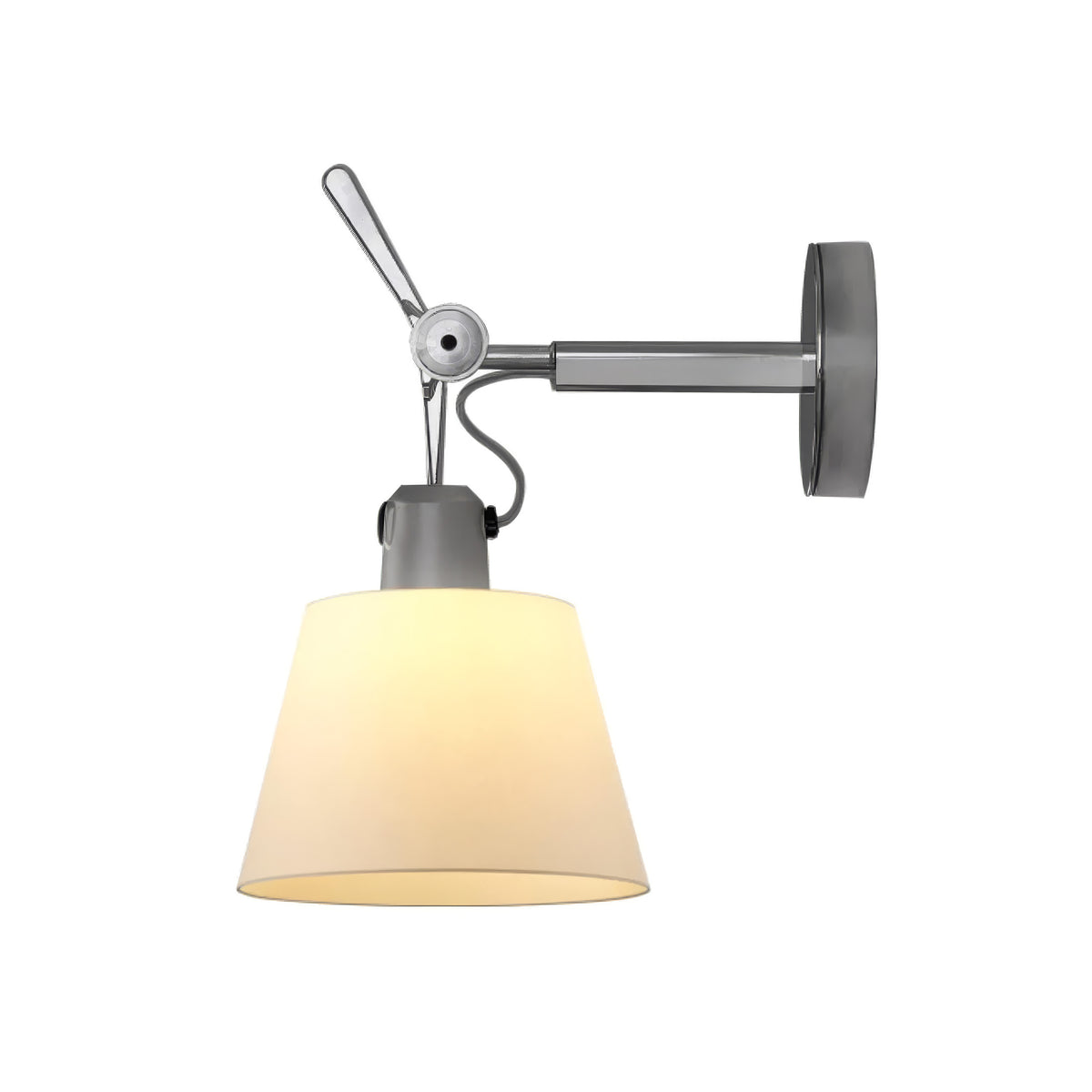 Artemide Tolomeo Diffusore Wall by Michele De Lucchi. Gray metal fixture with cream fabric shade glows warmly.