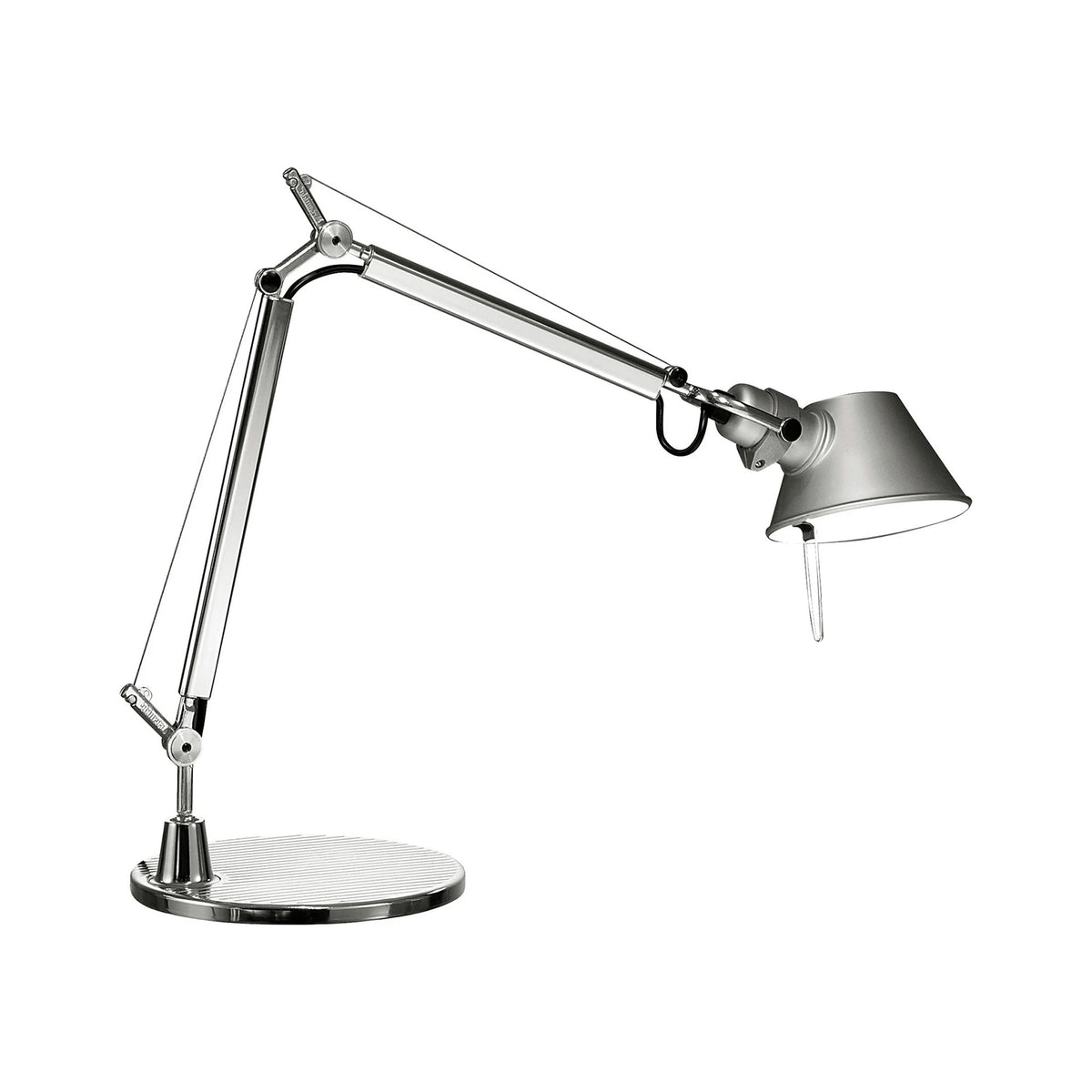 Artemide Tolomeo Table by Michele De Lucchi. A polished metal desk lamp with an adjustable arm and conical shade.