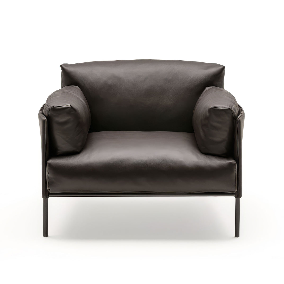 Living Divani Greene Armchair by David Lopez Quincoces. Black leather chair with metal legs on white background.