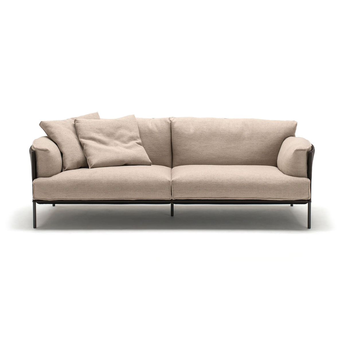 Living Divani Greene Sofa by David Lopez Quincoces. Beige upholstered sofa with rolled arms and dark metal legs.