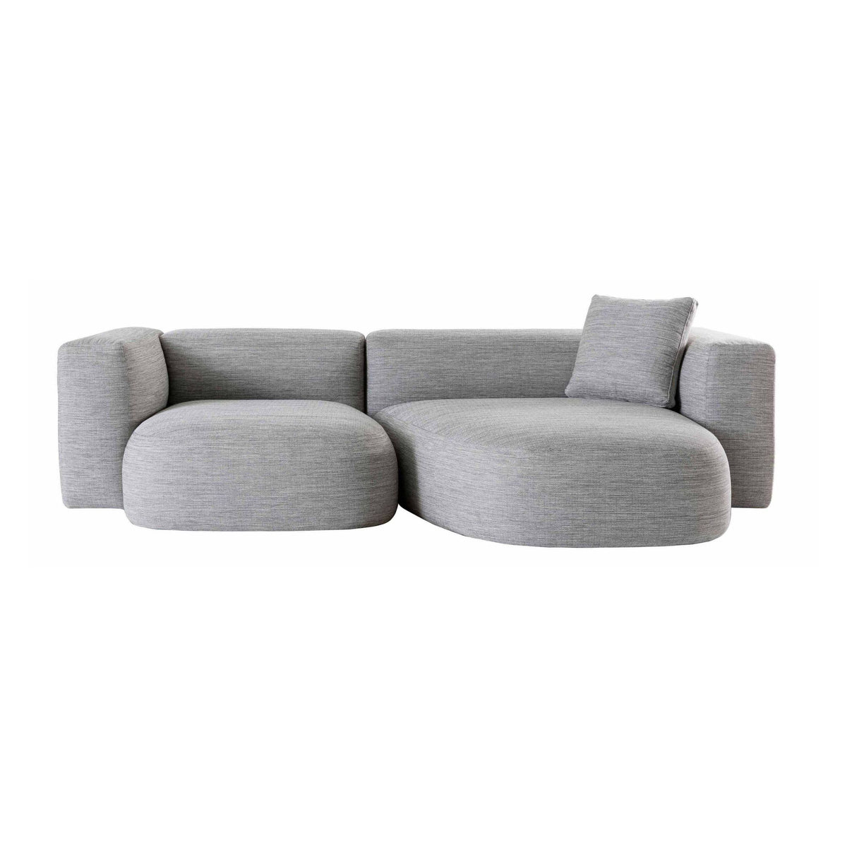 Cappellini Litos by Sebastian Herkner. A gray upholstered sectional sofa features curved forms and rounded cushions.