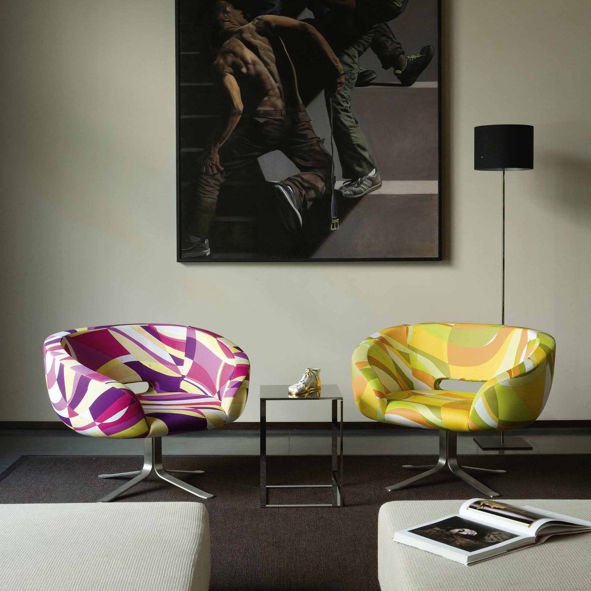 Cappellini Rive Droite by Patrick Norguet. Two vibrant patterned chairs sit facing each other in a modern gallery space.