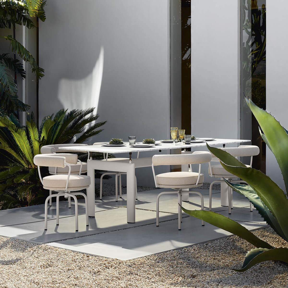 Mobile / BlackMenu / LC7 Dining Chair - Outdoor, designed by Charlotte Perriand made by Cassina