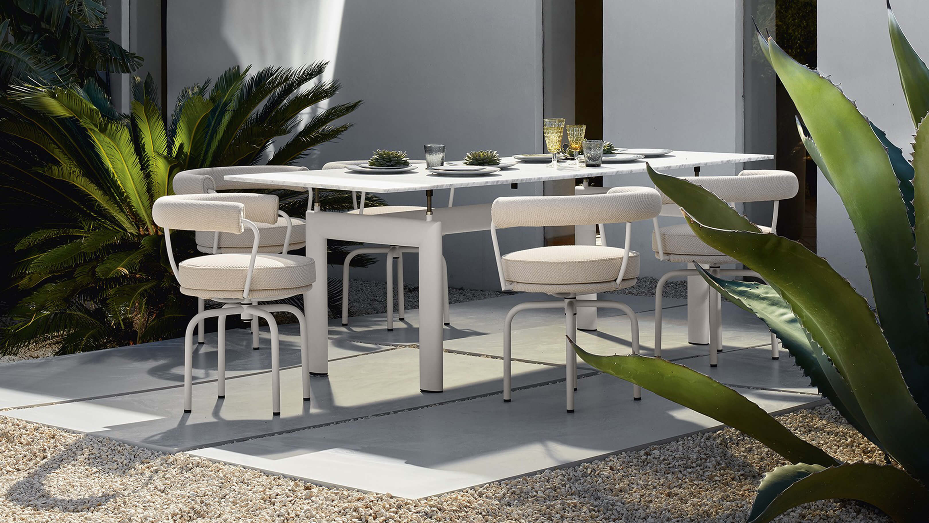 Desktop / BlackMenu / LC7 Dining Chair - Outdoor, designed by Charlotte Perriand made by Cassina