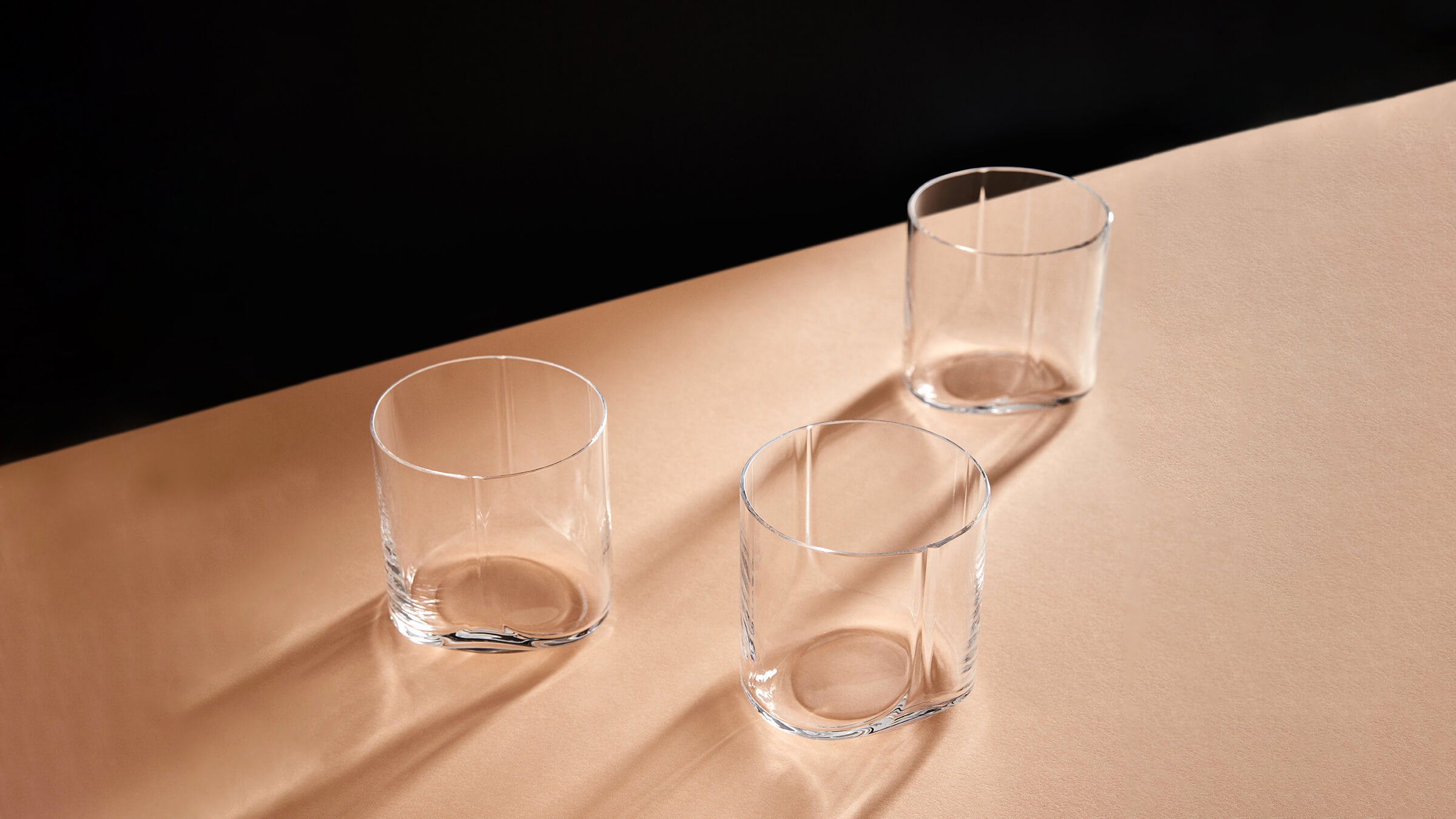 Desktop / WhiteMenu / Hew Tumblers, designed by Zaha Hadid Design