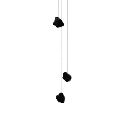Bocci 57.3 Random by Omer Arbel. Three black knots hang from thin strings against a white background.