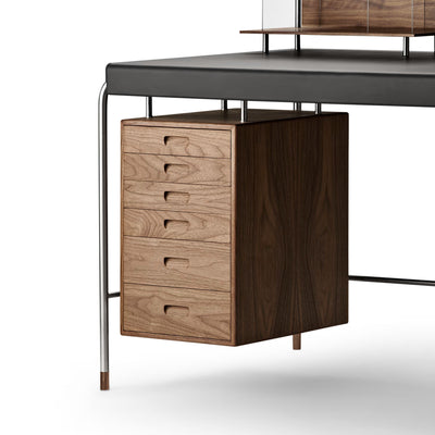Carl Hansen & Søn AJ52 Society Table by Arne Jacobsen. Wooden drawer unit with metal frame beneath gray desk.