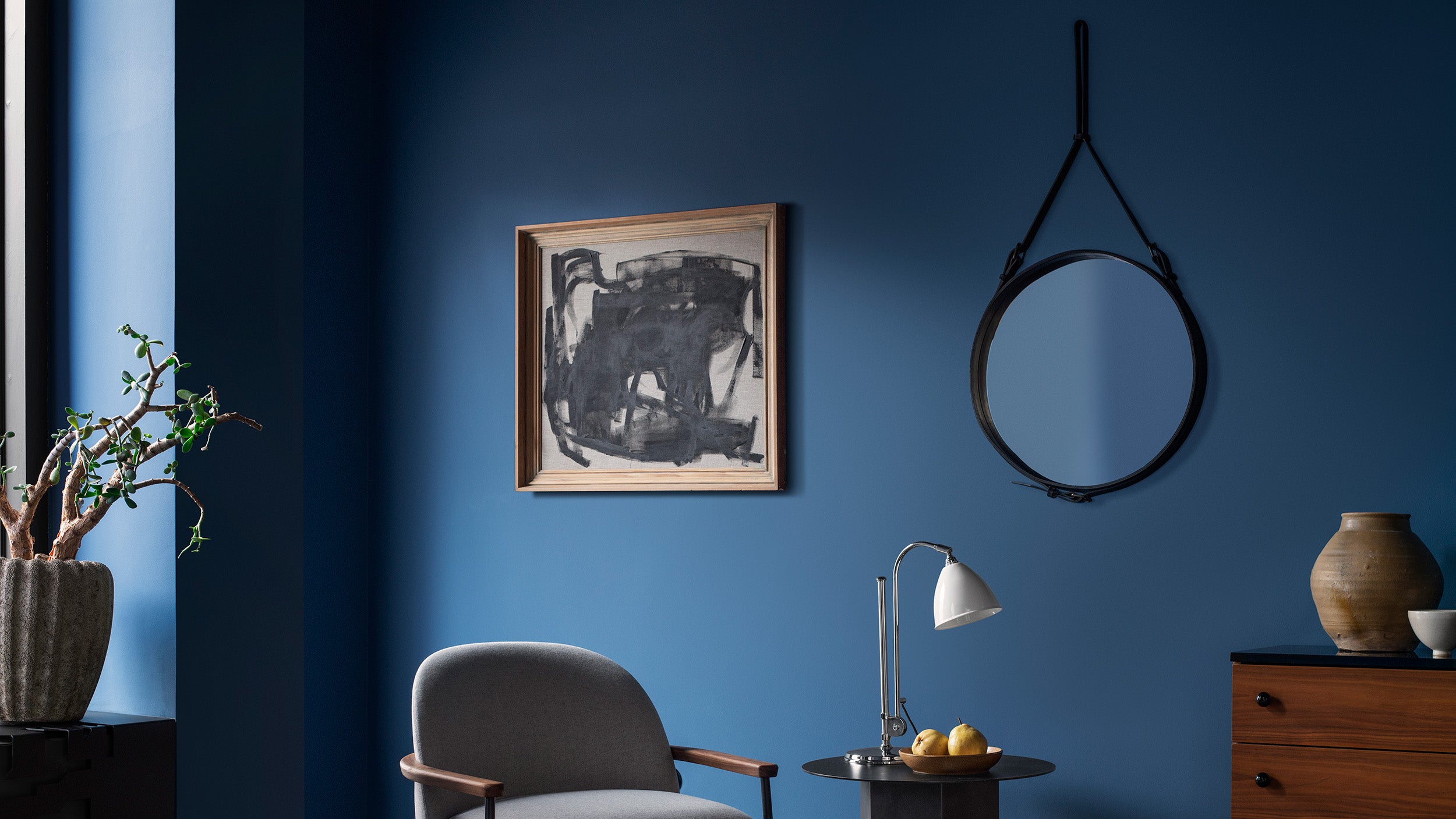 Desktop / Adnet Wall Mirror, designed by Jacques Adnet and made by Gubi