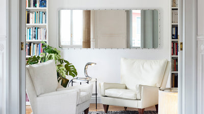 Desktop / Adnet Wall Mirror, designed by Jacques Adnet and made by Gubi