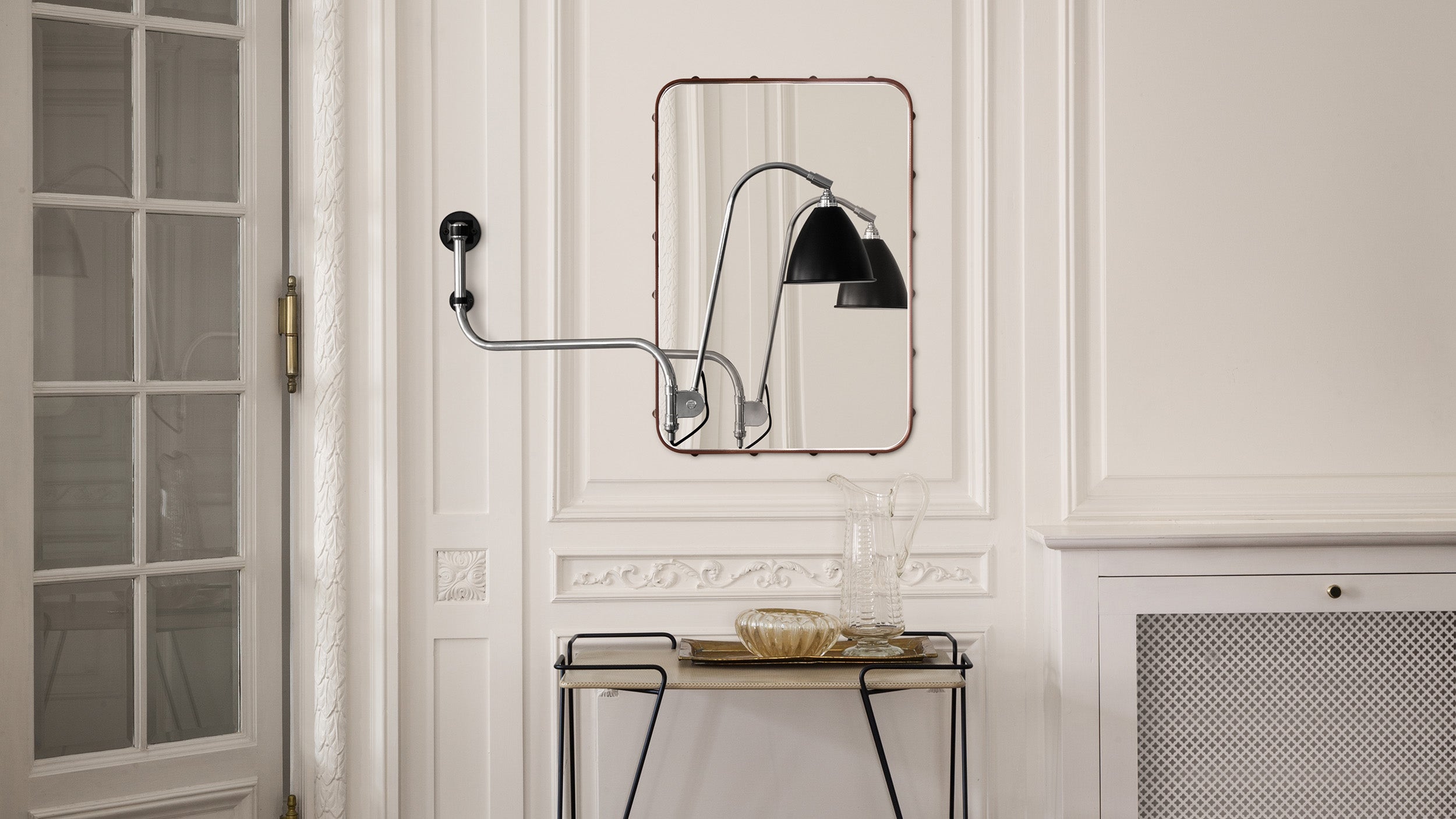 Desktop / Adnet Wall Mirror, designed by Jacques Adnet and made by Gubi