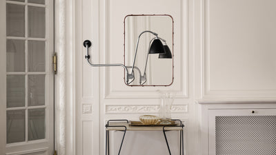 Desktop / Adnet Wall Mirror, designed by Jacques Adnet and made by Gubi