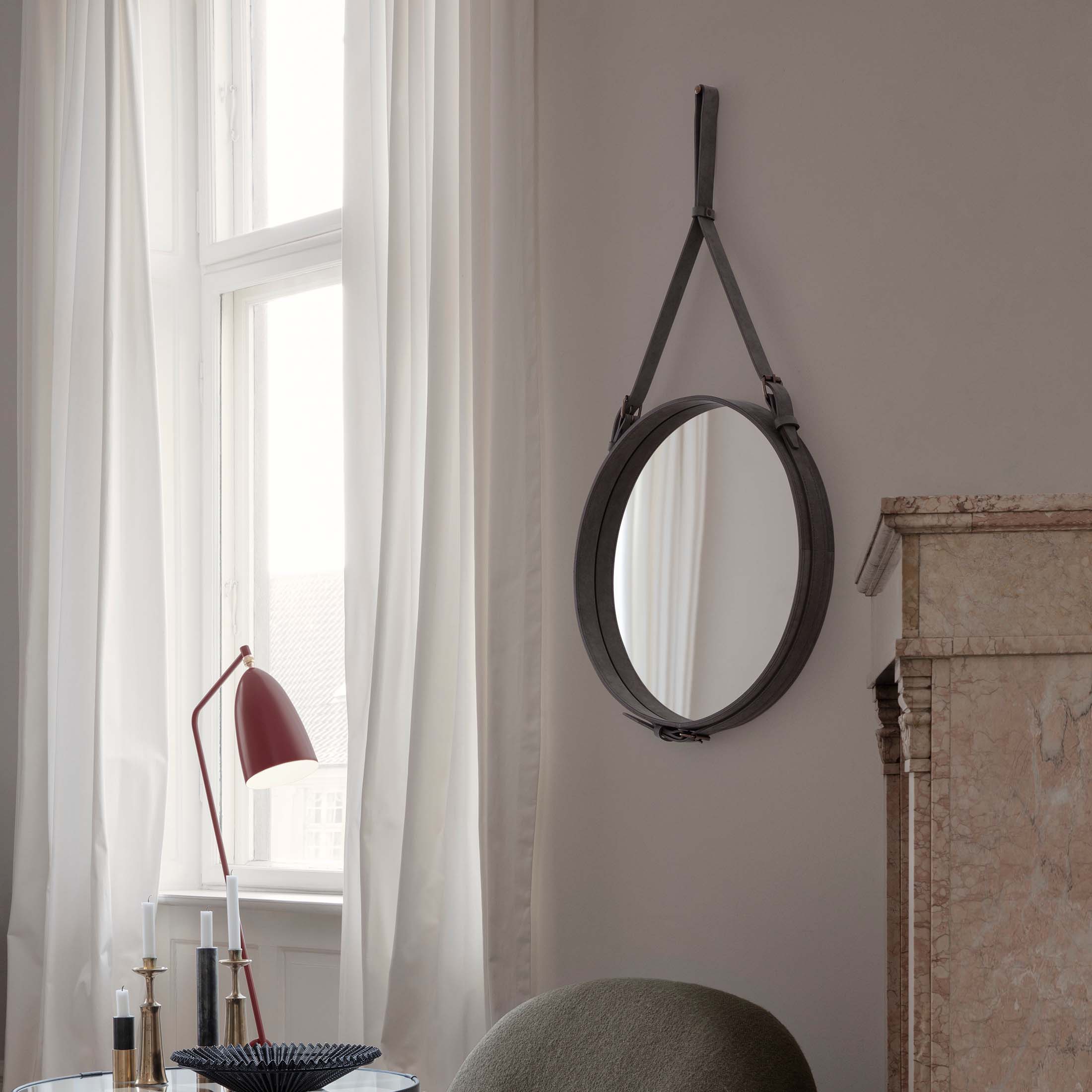 Mobile / Adnet Wall Mirror, designed by Jacques Adnet and made by Gubi