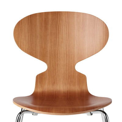 Fritz Hansen Ant™ Chair, 4 Legs - 3101 by Arne Jacobsen. A bent plywood chair in warm wood finish on metal legs.