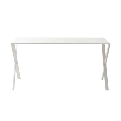 Cappellini Bambi by Nendo. A minimalist white table with an X-frame design and clean lines.