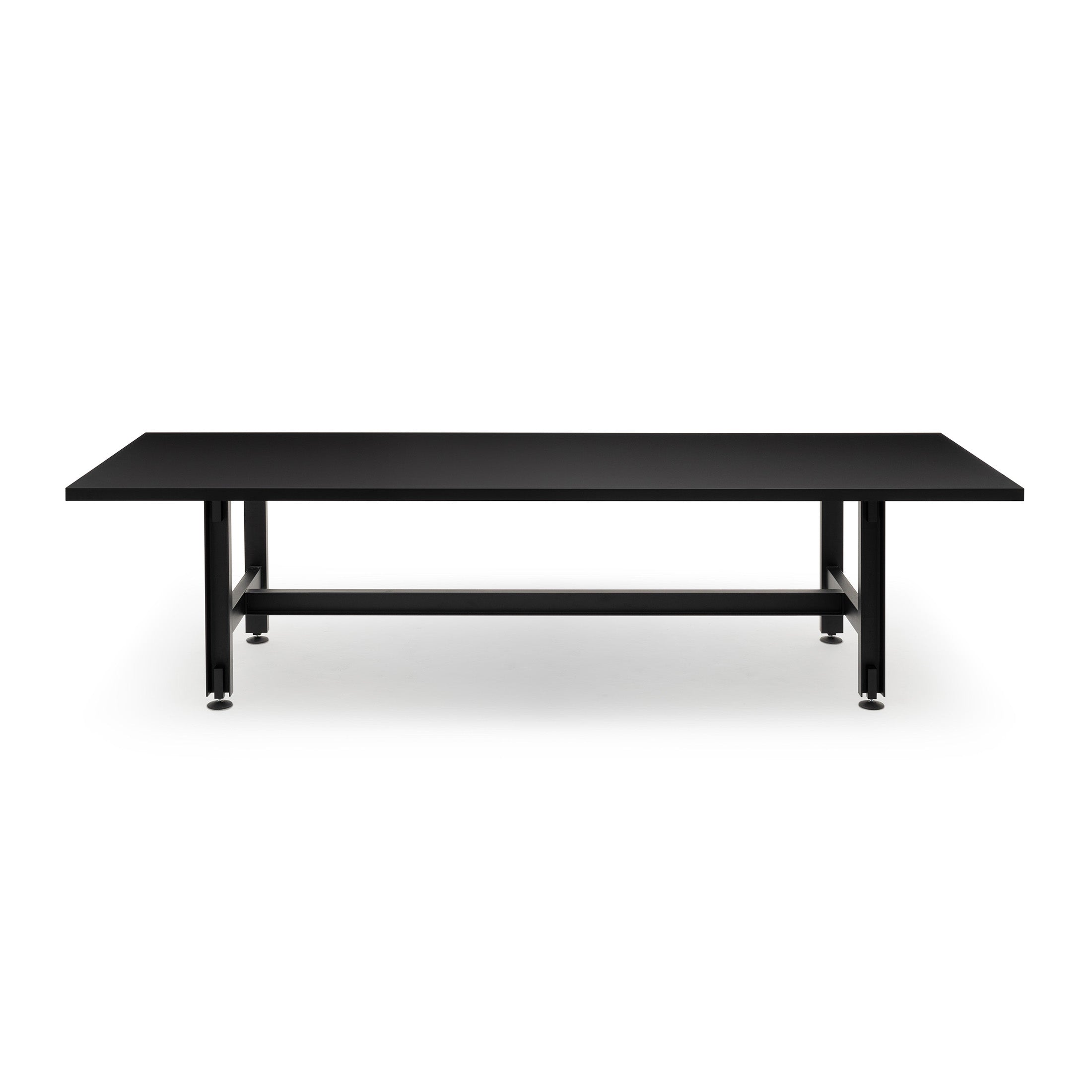 Established & Sons Beam Table by Konstantin Grcic. A sleek black table with metal legs and a lower shelf.