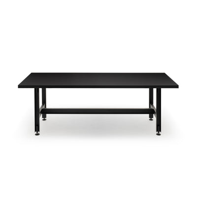 Established & Sons Beam Table by Konstantin Grcic. A sleek black metal table with a sturdy frame and shelf.
