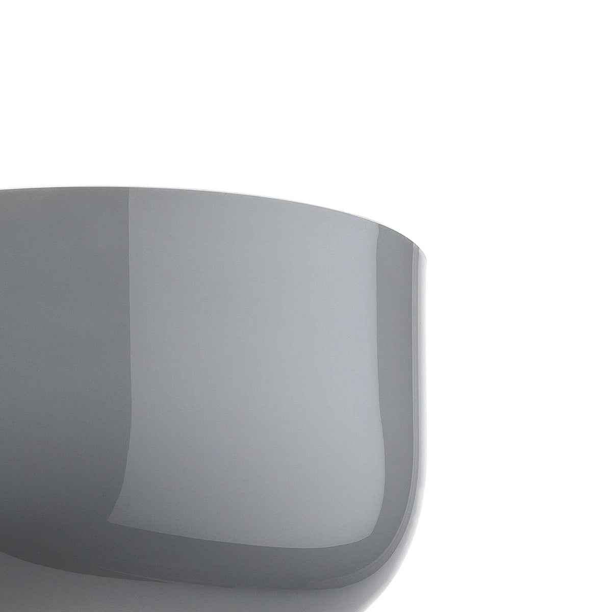 Flos Bellhop Wall Up by Edward Barber. A sleek, curved gray container with a glossy finish sits against a white background.