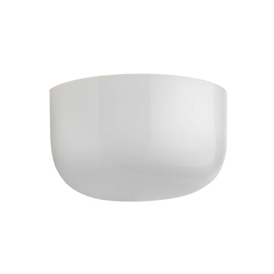 Flos Bellhop Wall Up by Edward Barber. A smooth, translucent white dome sits against a clean, bright background.