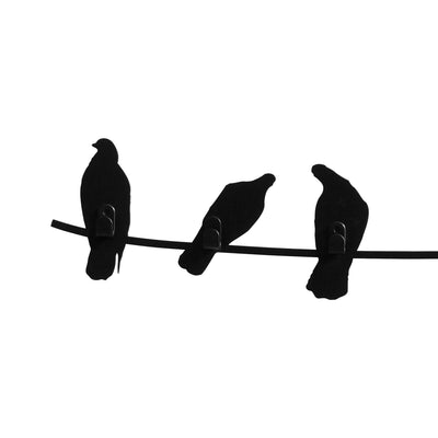 COVO Birds on Wire by Harry Allen. Three black bird silhouettes perch together on a horizontal wire.