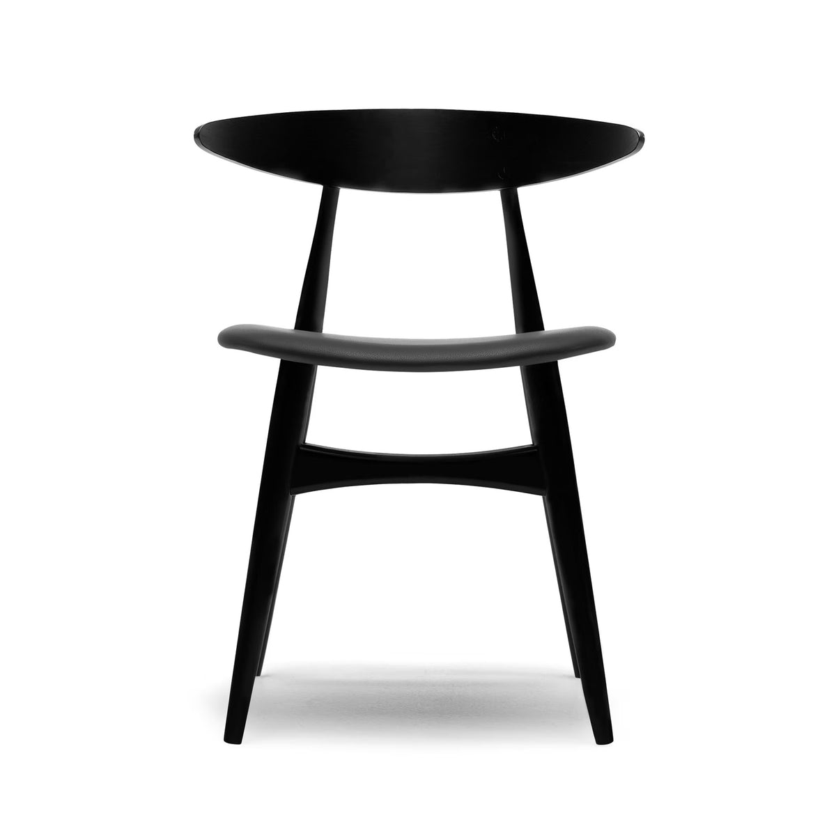 Carl Hansen & Søn CH33P Chair by Hans J. Wegner. A sleek black wooden chair with curved backrest and angled legs.