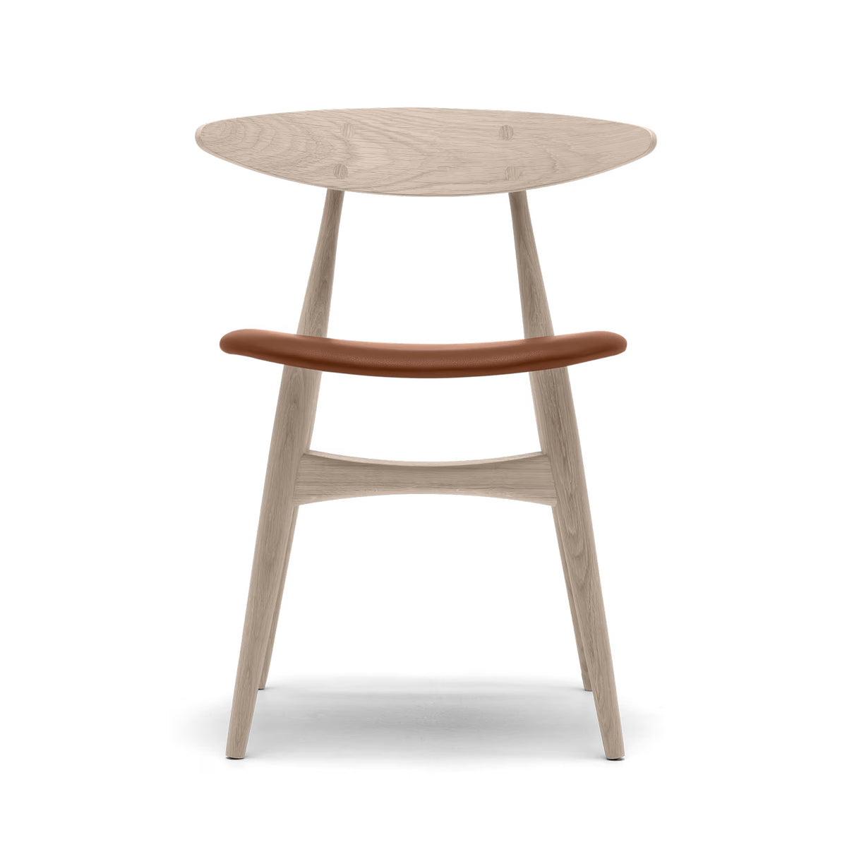 Carl Hansen & Søn CH33P Chair by Hans J. Wegner. A light wood chair features a brown leather backrest and tapered legs.