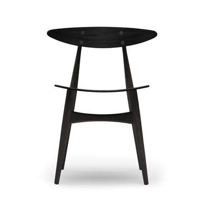 Carl Hansen & Søn CH33T Chair by Hans J. Wegner. Black wooden stool with curved seat and angled legs.