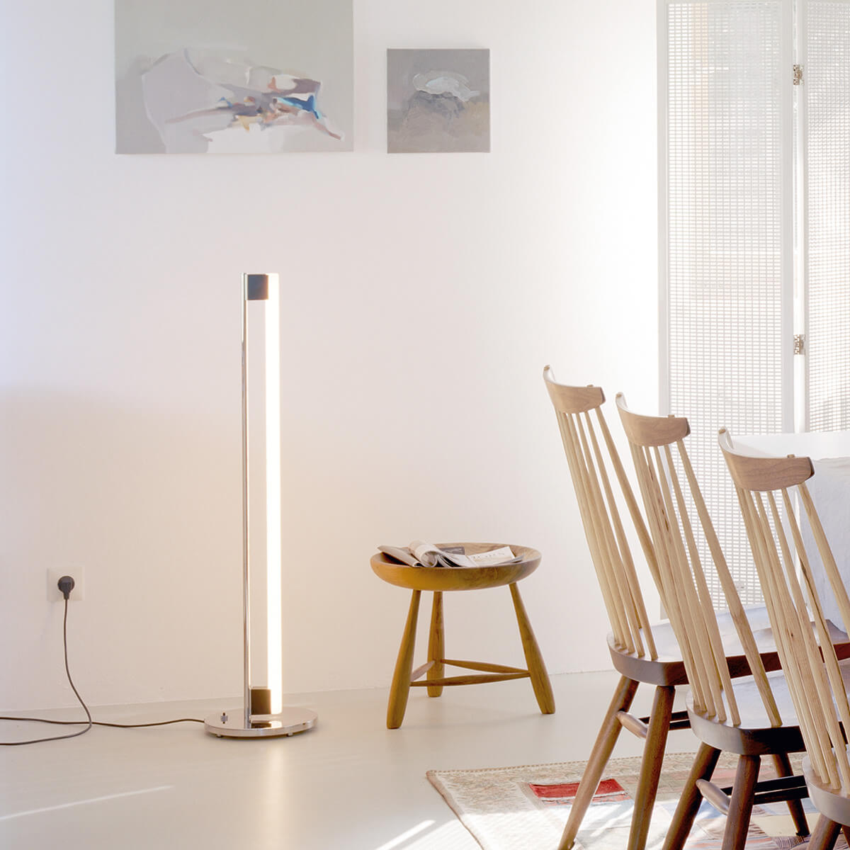 Mobile / BlackMenu / Tube Light Floor Lamp, designed by Eileen Gray