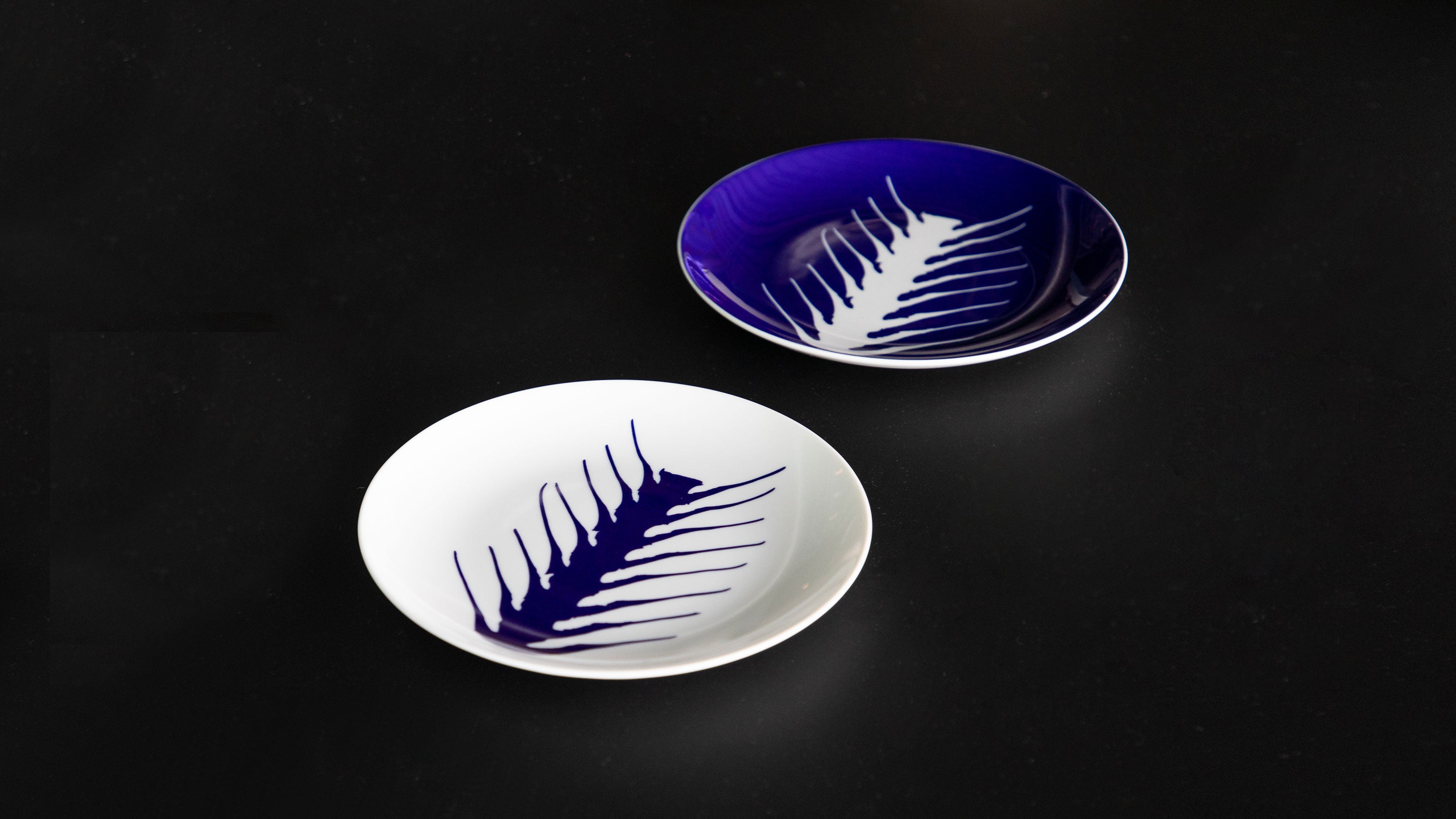 Desktop / Arete Set of 2 Dessert Plates, designed by Charlotte Perriand and made by Cassina