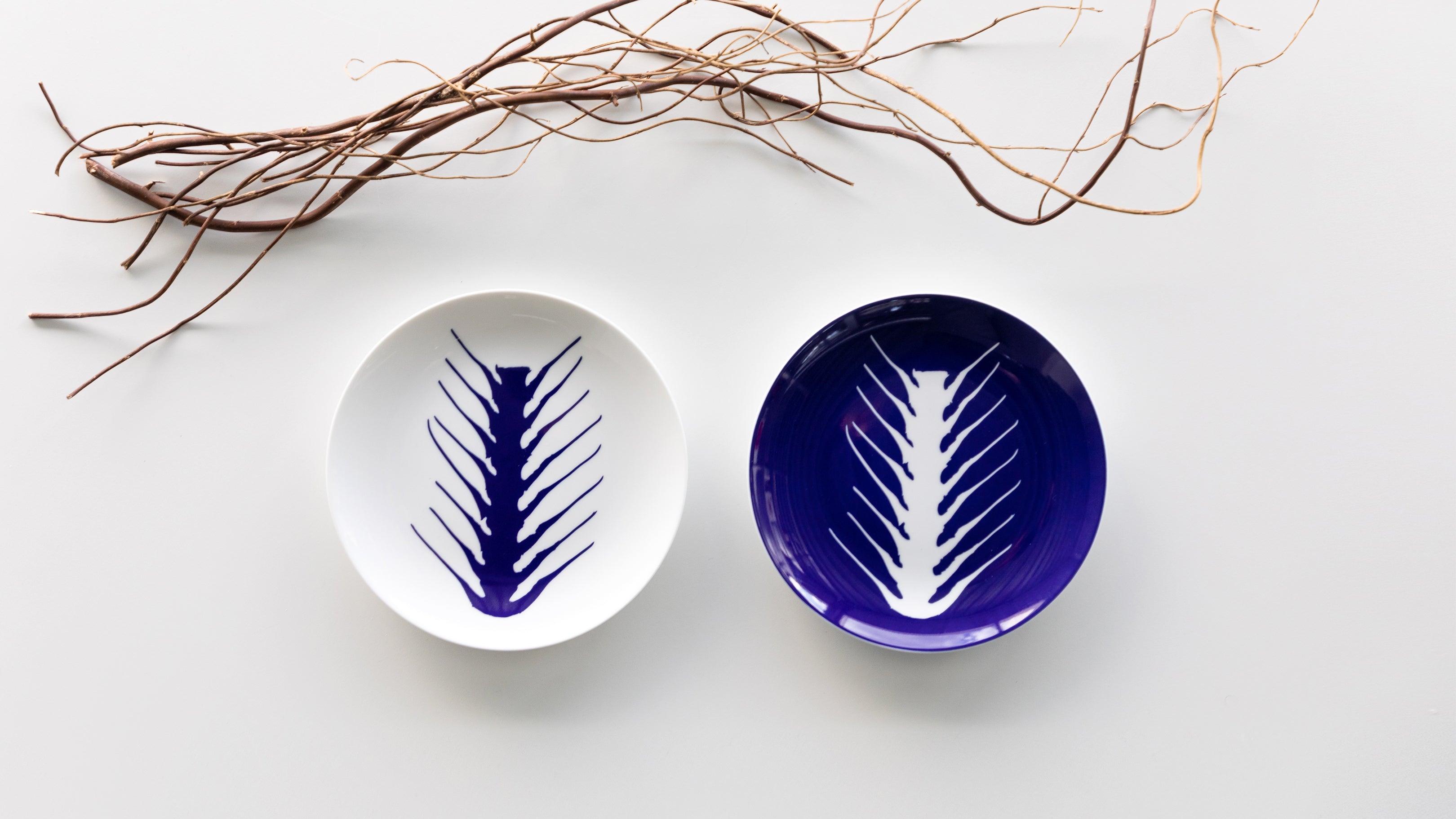 Desktop / Arete Set of 2 Dessert Plates, designed by Charlotte Perriand and made by Cassina