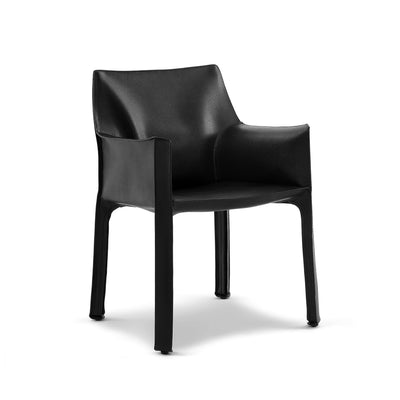 Cassina Cab Armchair by Mario Bellini. A sleek black leather chair with minimalist design and sturdy legs.