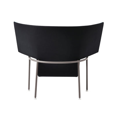 Cappellini Capo by Doshi Levien. A modern black chair with a curved back and metal legs is shown from behind.