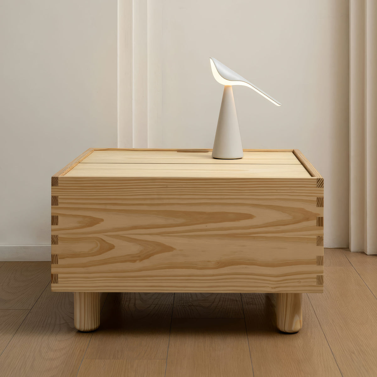 Established&Sons Crate Series by Jasper Morrison. A wooden box with a white ceramic bird sculpture sits in a minimalist room.