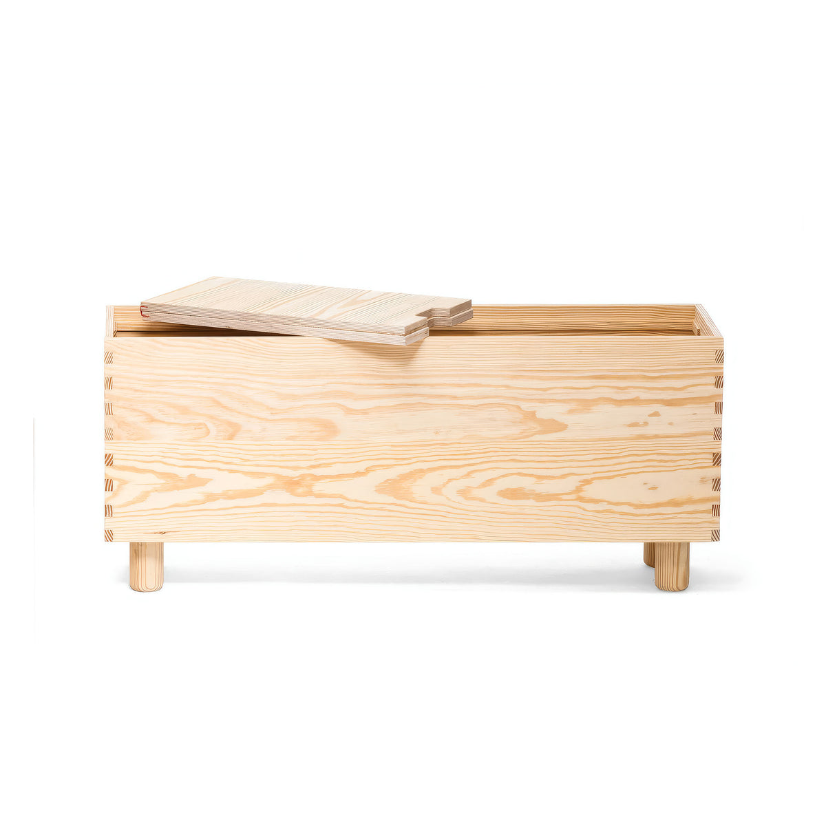 Established&Sons Crate Series by Jasper Morrison. A light wooden storage box with a hinged lid sits on cylindrical legs.