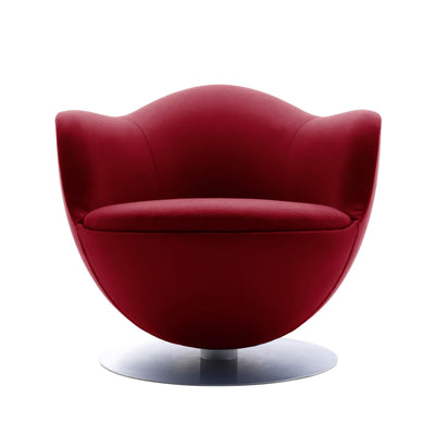 Cappellini Dalia by Marcel Wanders. A deep crimson upholstered chair with curved armrests sits on a metallic base.