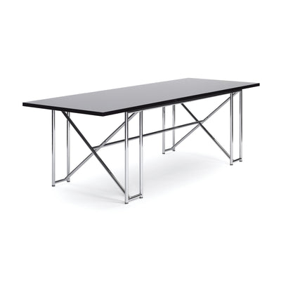 ClassiCon Double X by Eileen Gray. A sleek black tabletop rests on a polished metal frame with X-braced supports.